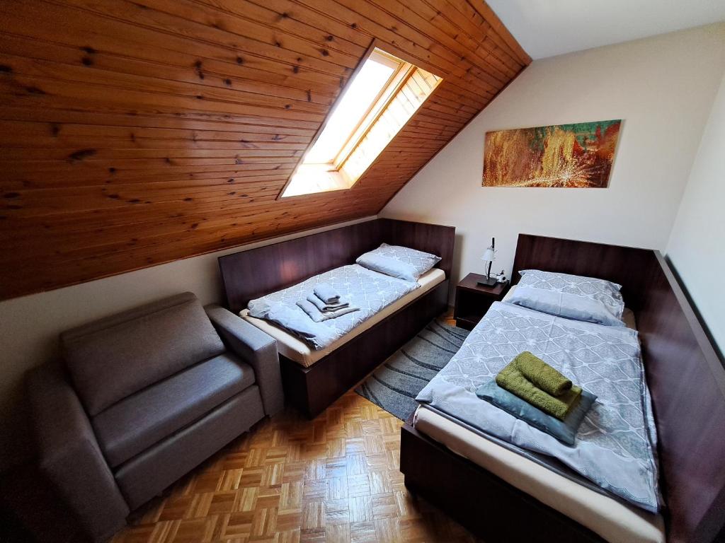 Postel nebo postele na pokoji v ubytování Villa in High Tatras Residence VDV