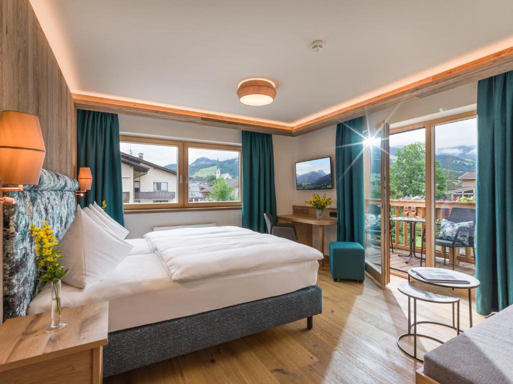 Postel nebo postele na pokoji v ubytování Hotel Zentral ****superior