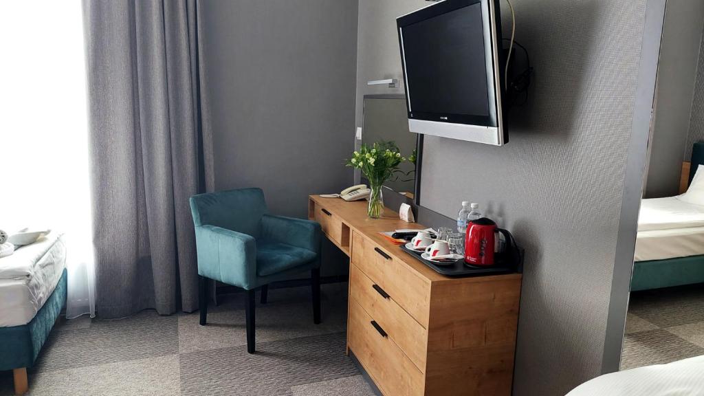 Posteľ alebo postele v izbe v ubytovaní Hotel Rad