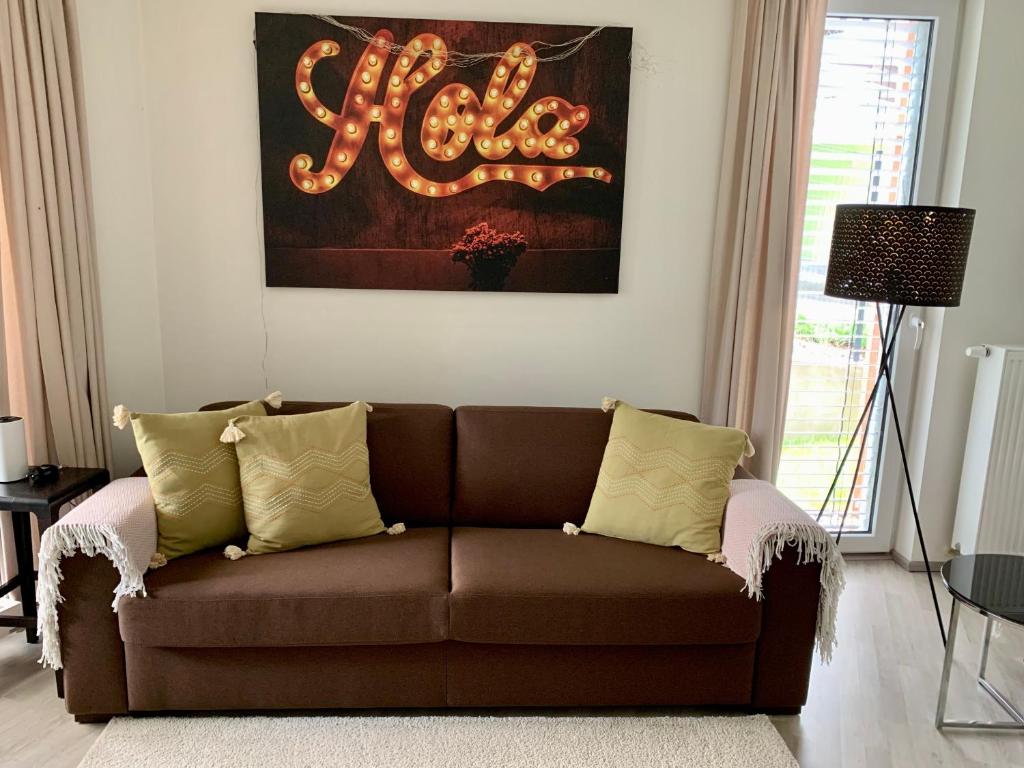 Posezení v ubytování Jezerní apartmán s terasou a saunou v Lakepark Residence