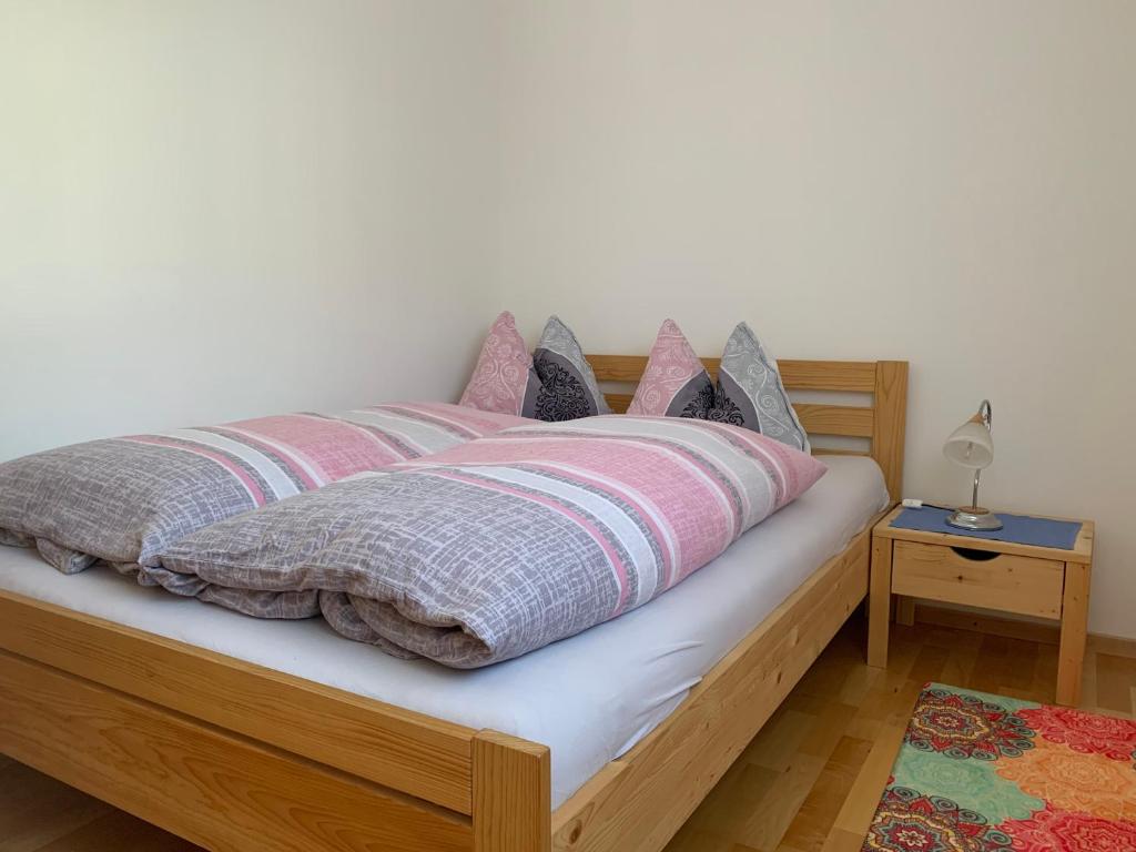 Postel nebo postele na pokoji v ubytování Ferienwohnung Sotcha 8c