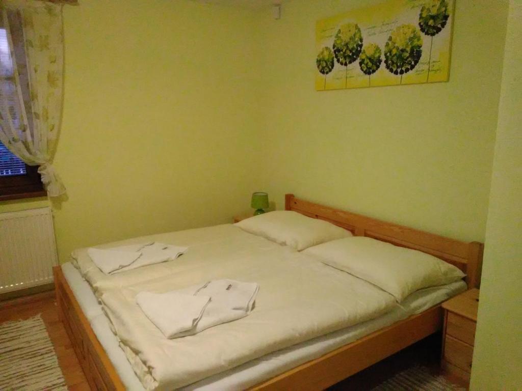 Postel nebo postele na pokoji v ubytování Pod palmou Gerlachov