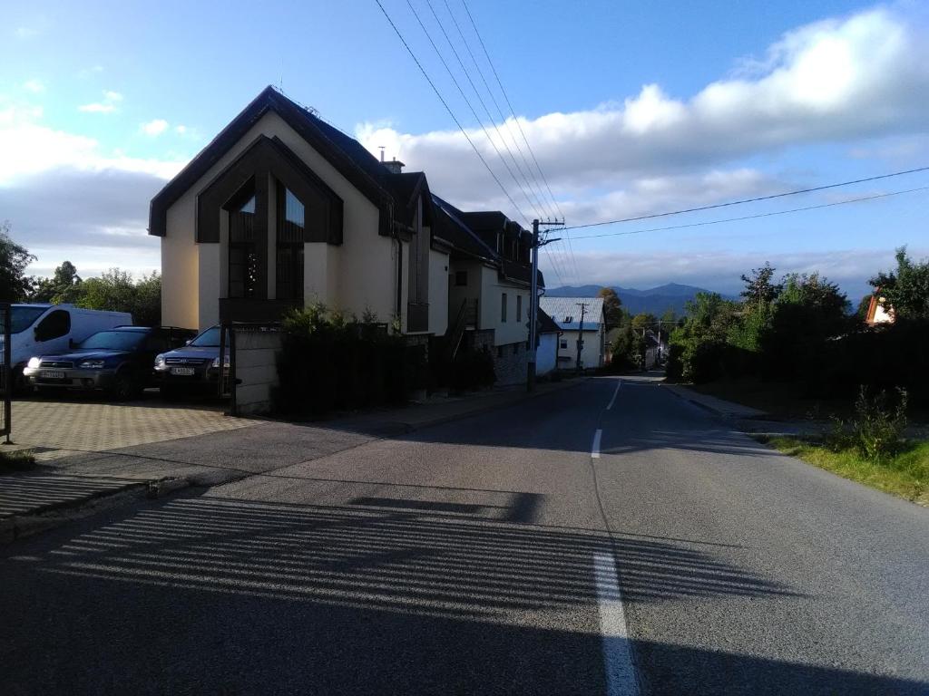 a house on the side of a road at Pod palmou Gerlachov in Gerlachov