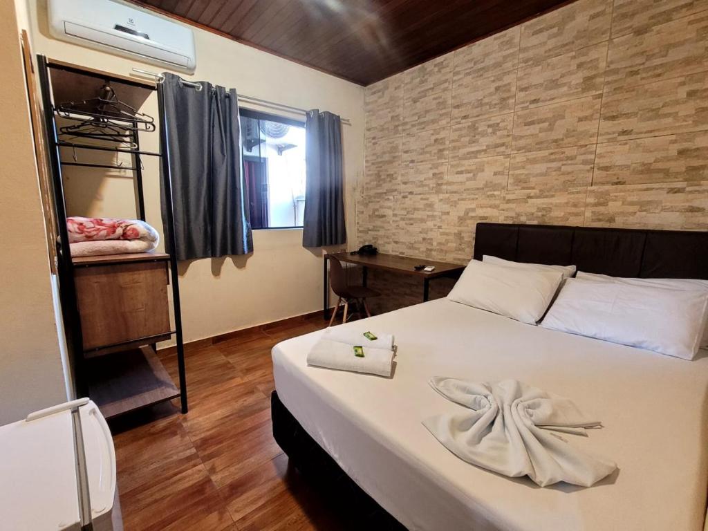 Cama ou camas em um quarto em Hotel Serra do Mar