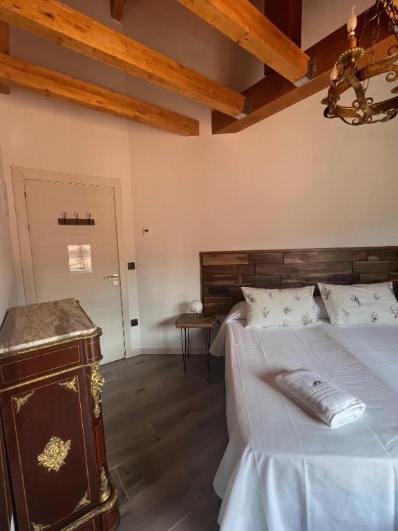 Postel nebo postele na pokoji v ubytování El hotel de Verdiago