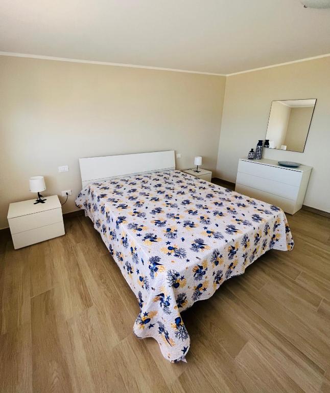 Posteľ alebo postele v izbe v ubytovaní Villa Lombardo Luxury