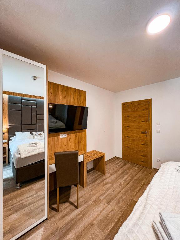 Postel nebo postele na pokoji v ubytování Sylpaulerhof Aparthotel