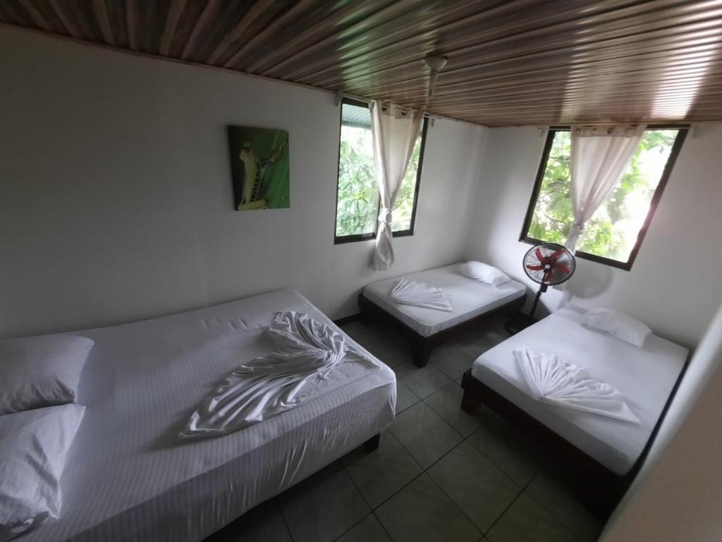 Postel nebo postele na pokoji v ubytování Casa Caribe