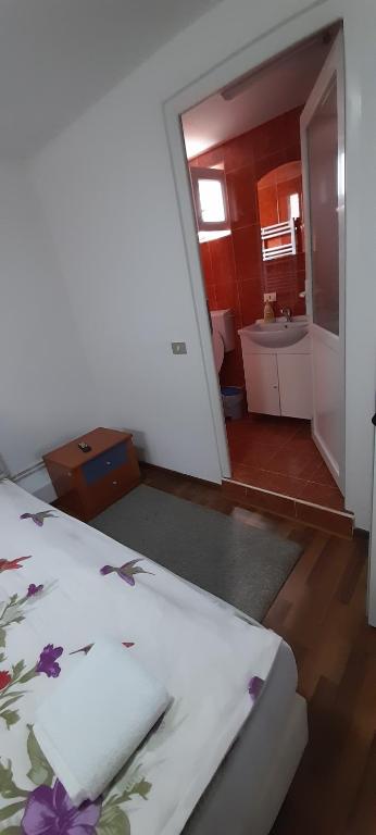 Postel nebo postele na pokoji v ubytování Casa dina