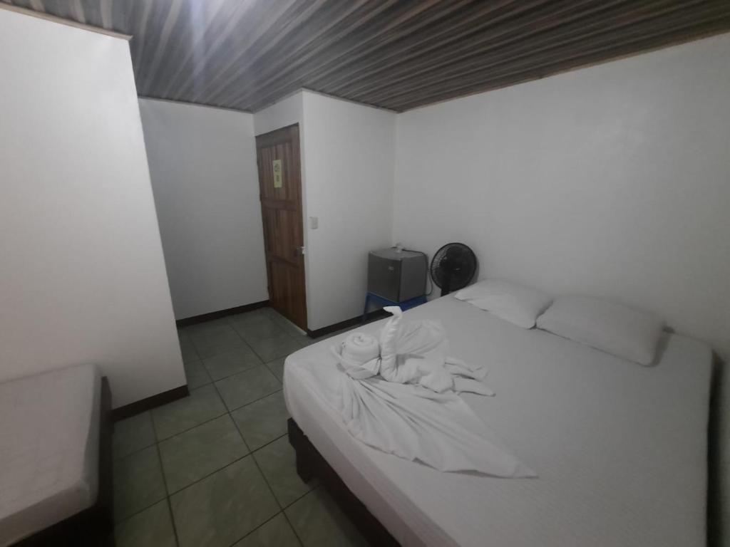 Postel nebo postele na pokoji v ubytování Casa Caribe
