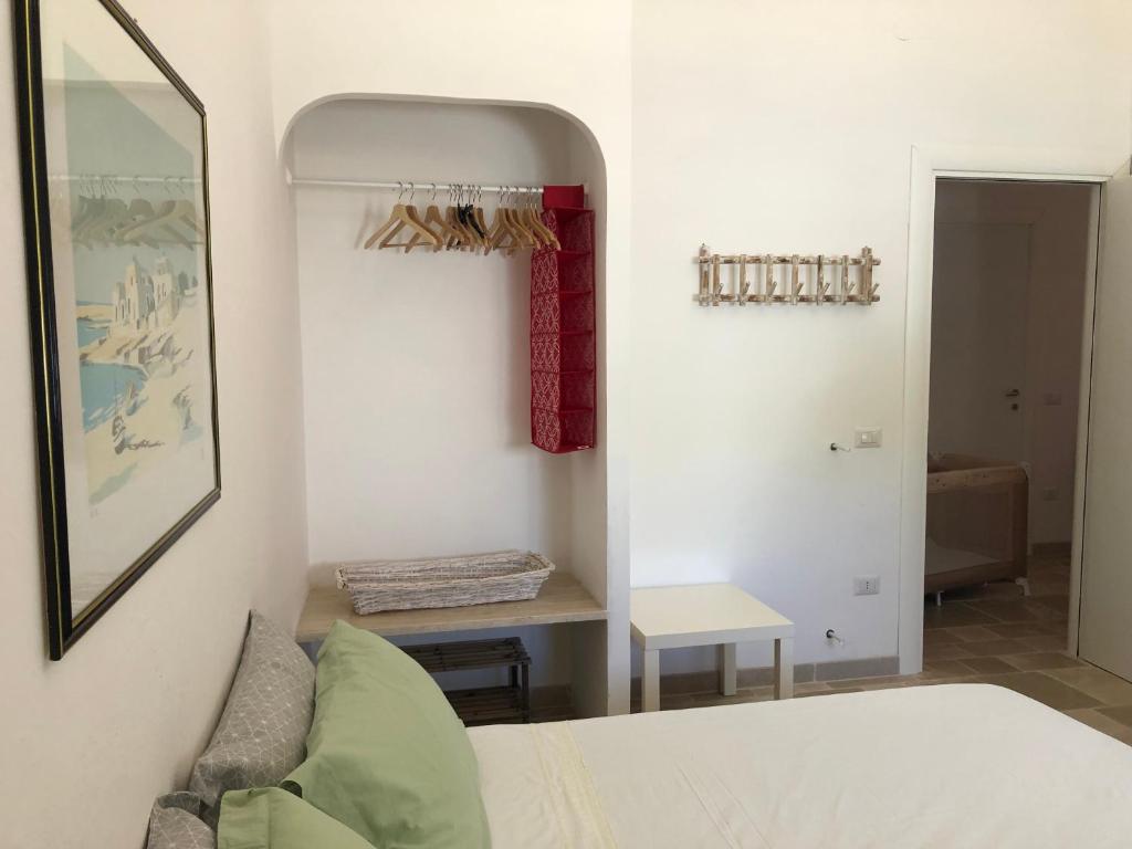 Postel nebo postele na pokoji v ubytování FICOMORO surf house