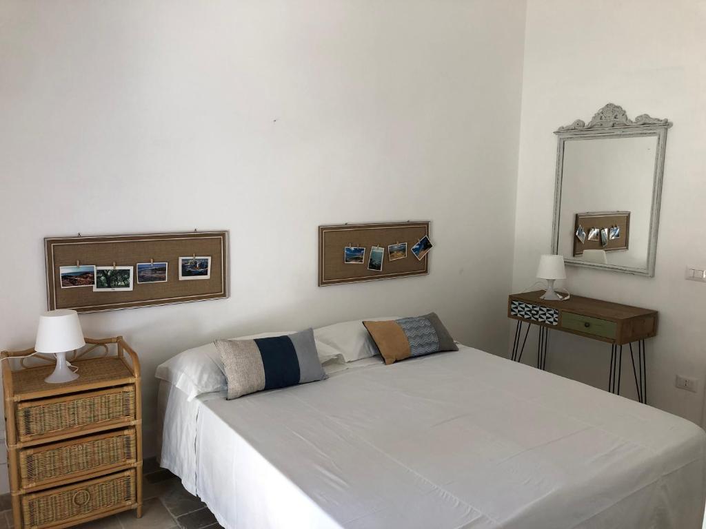 Postel nebo postele na pokoji v ubytování FICOMORO surf house