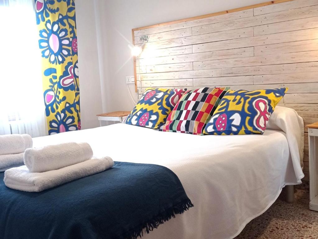 A bed or beds in a room at Casa de Antonio MURCHANTE