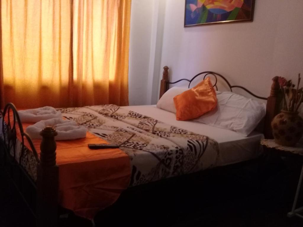Postel nebo postele na pokoji v ubytování Isla Bonita Beach Resort