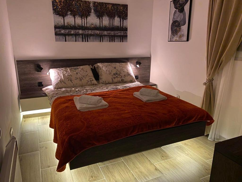 Ein Bett oder Betten in einem Zimmer der Unterkunft Planinac 03