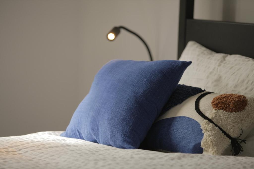Postel nebo postele na pokoji v ubytování MAISON KITOKO
