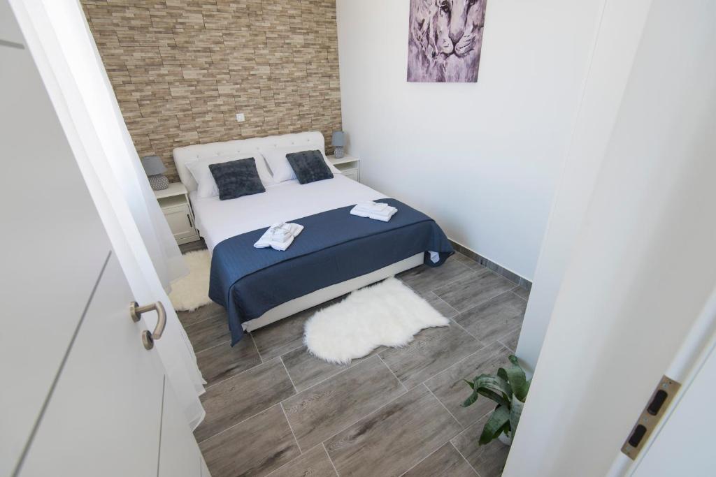 Posteľ alebo postele v izbe v ubytovaní Pleasure Sea View Apartment Zadar