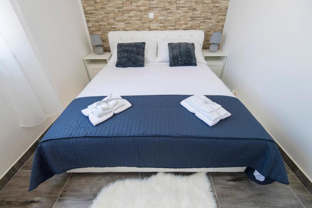 Posteľ alebo postele v izbe v ubytovaní Pleasure Sea View Apartment Zadar