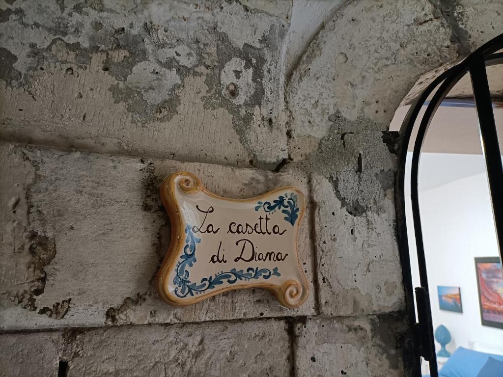 Certyfikat, podpis lub inny dokument wystawiony w obiekcie La casetta di Diana Ortigia