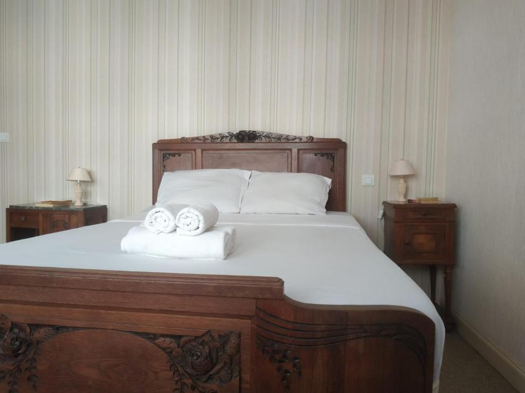 Łóżko lub łóżka w pokoju w obiekcie Classic House