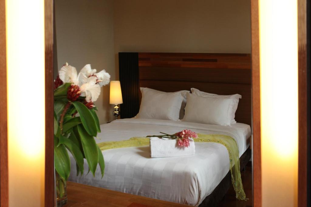 Letto o letti in una camera di The Ranee Boutique Suites