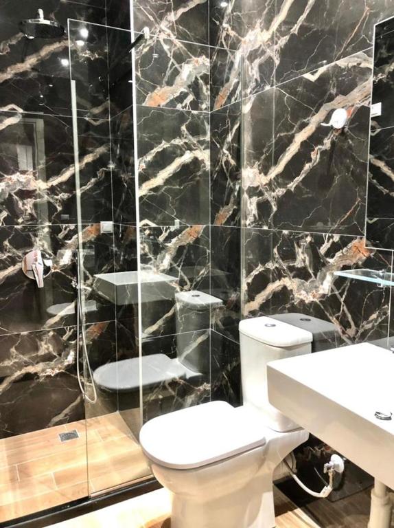Koupelna v ubytování VIAL Rooms