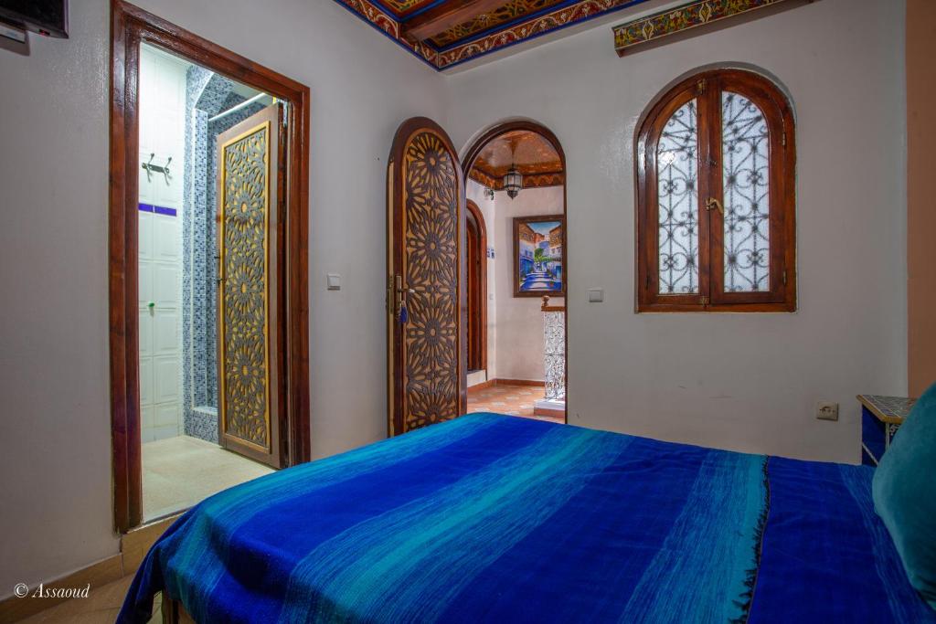 Postel nebo postele na pokoji v ubytování Hotel Chams