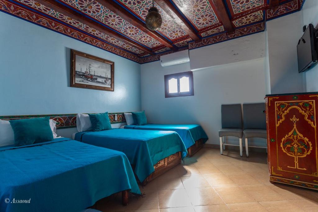 Postel nebo postele na pokoji v ubytování Hotel Chams