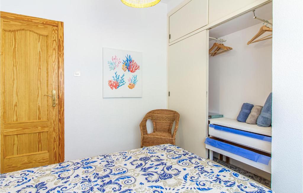 A bed or beds in a room at 3 Bedroom Nice Apartment In San Javier