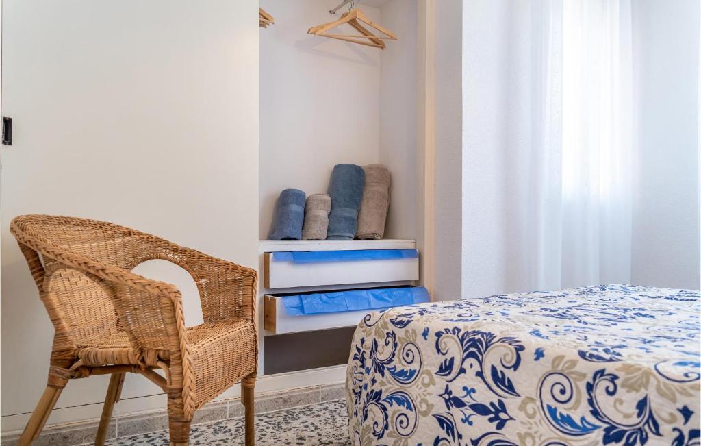 A bed or beds in a room at 3 Bedroom Nice Apartment In San Javier