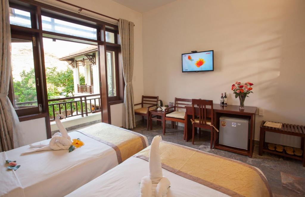 Cama o camas de una habitación en Hoi An TNT Villa