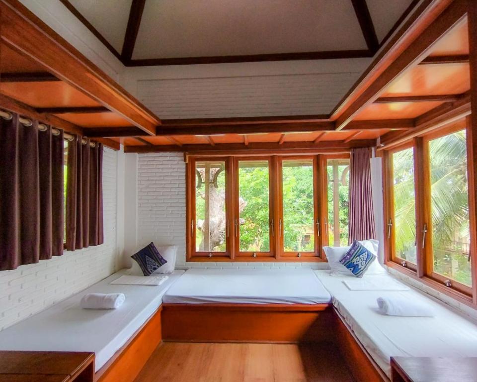 Postel nebo postele na pokoji v ubytování BIG K HOSTEL