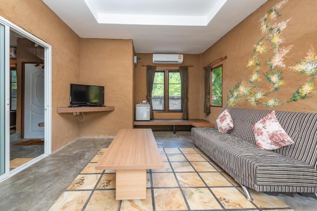 TV a/nebo společenská místnost v ubytování Muntra Garden Resort