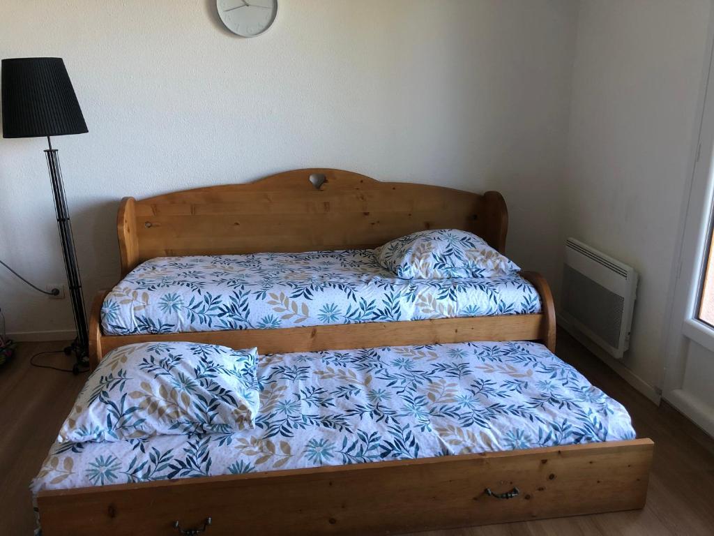 Posteľ alebo postele v izbe v ubytovaní SUPER BESSE Appartement LE GÎTE BESSARD 6 couchages Le Bois de la Reine