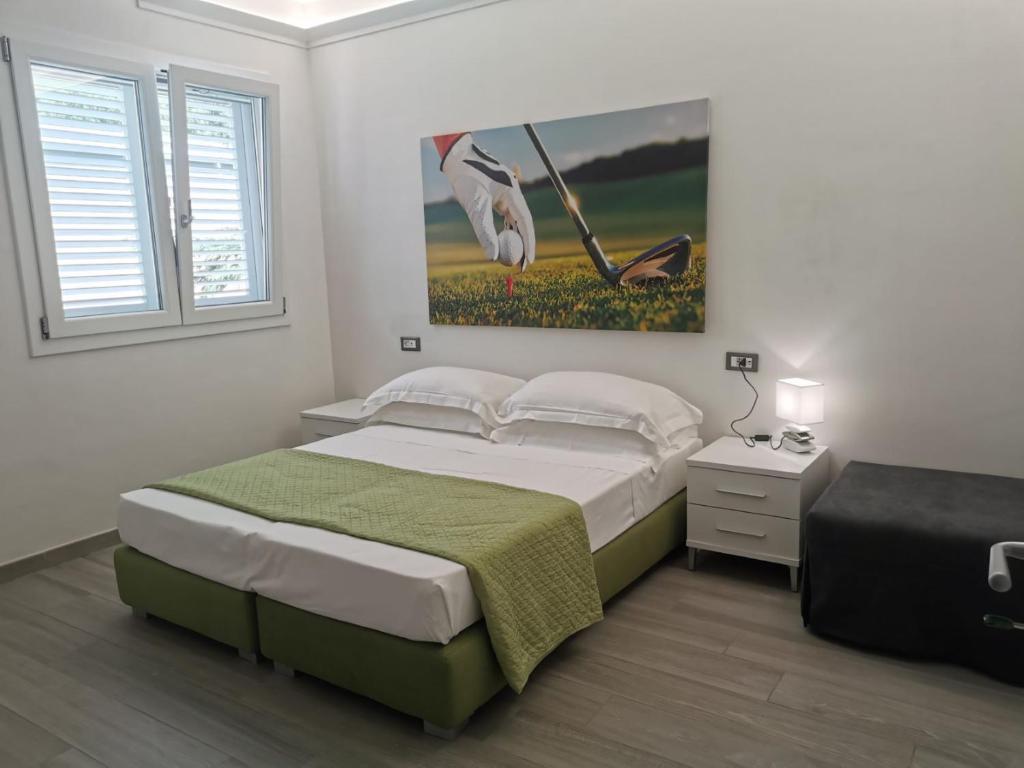 Puntaalarooms tesisinde bir odada yatak veya yataklar