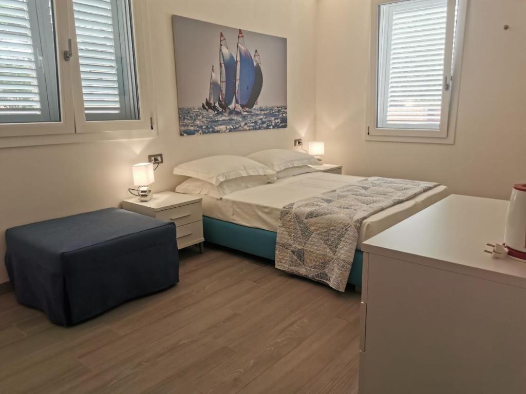 Puntaalarooms tesisinde bir odada yatak veya yataklar