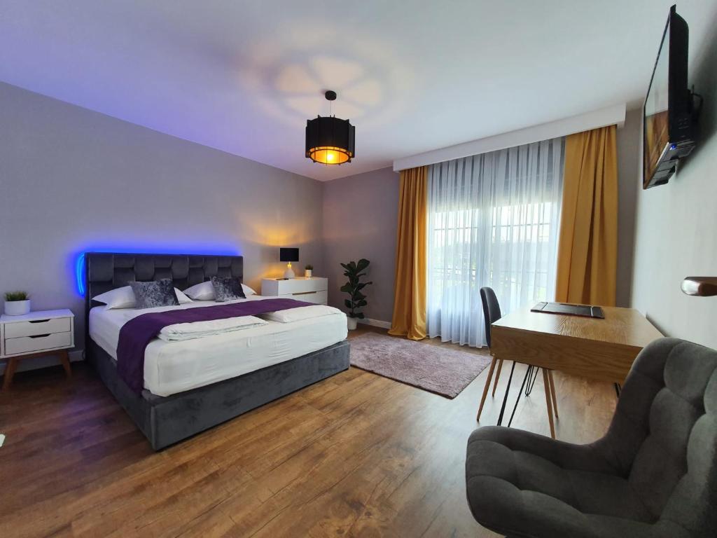 Postel nebo postele na pokoji v ubytování Prestige by Privilege Felix