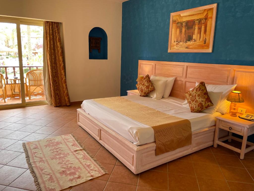 Кровать или кровати в номере Dream Lagoon Resort & Aqua Park