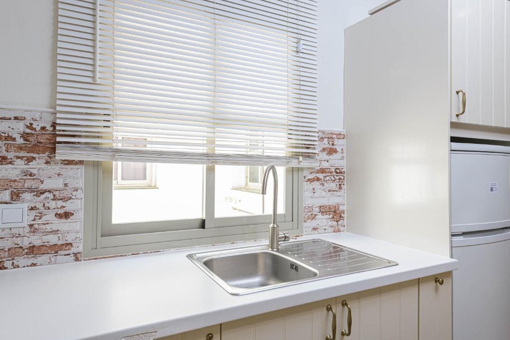 Kuchnia lub aneks kuchenny w obiekcie WintoWinRentals Genial Apartamento, Céntrico y Silencioso
