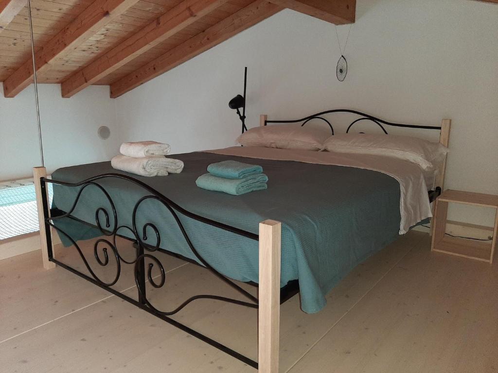 Postel nebo postele na pokoji v ubytování Il Nido