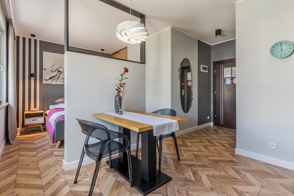 Posteľ alebo postele v izbe v ubytovaní Lead Apartment