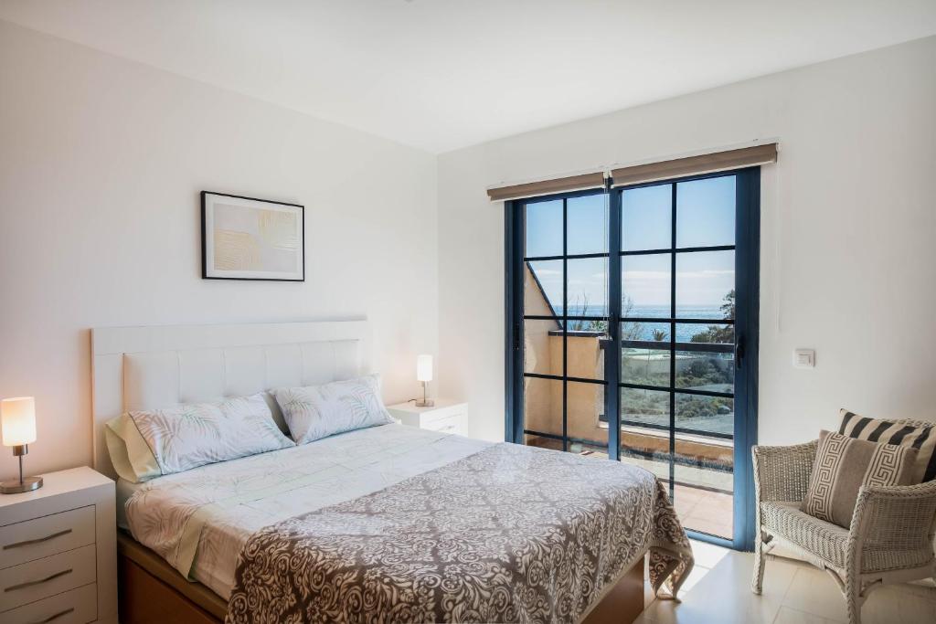 A bed or beds in a room at Casa Marine