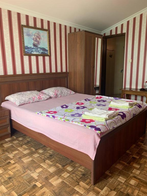 Postel nebo postele na pokoji v ubytování Guest House Rusalka