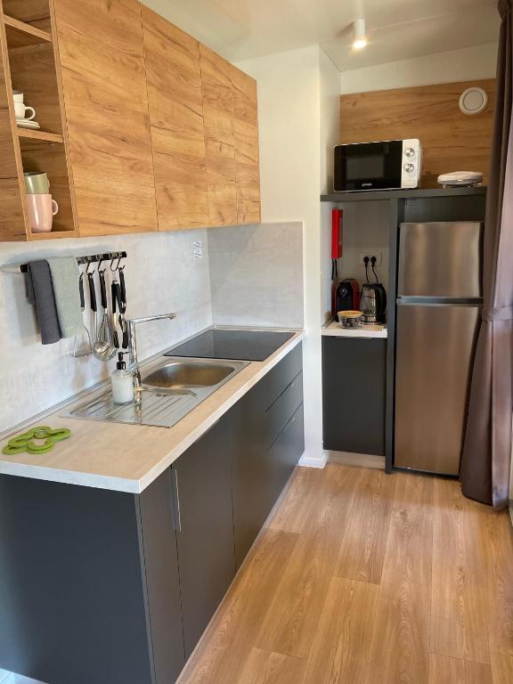 Kuchyňa alebo kuchynka v ubytovaní Mobile Home Aurora Selce