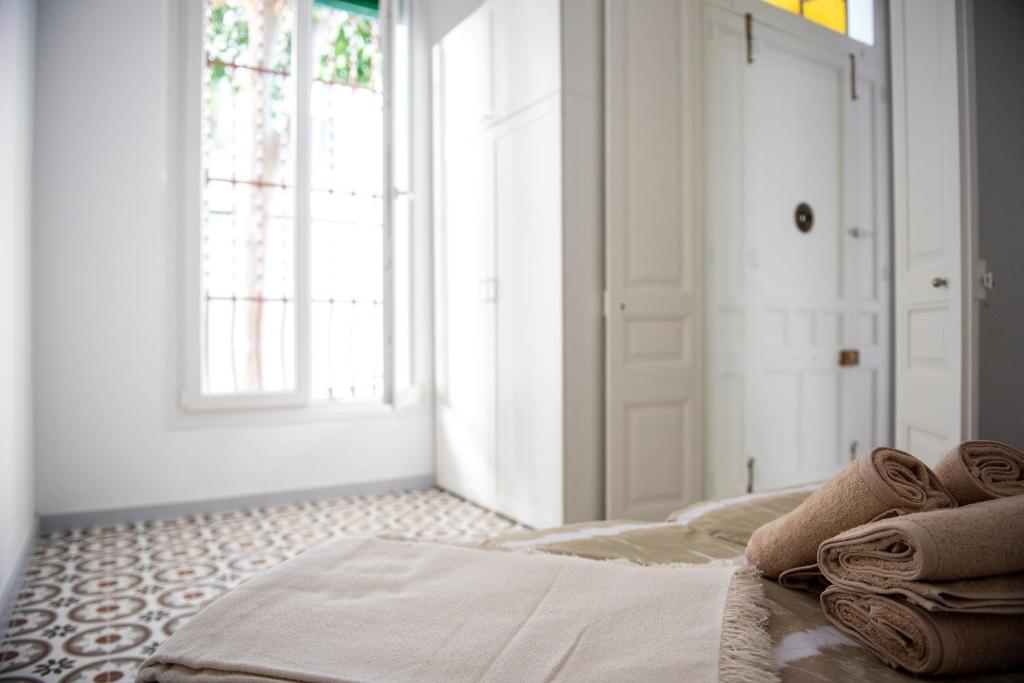 Postel nebo postele na pokoji v ubytování Hauzify I Apartament Can Missé
