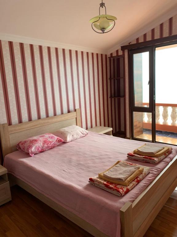 Postel nebo postele na pokoji v ubytování Guest House Rusalka