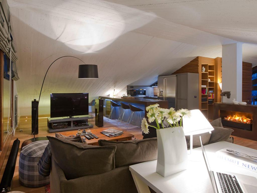 TV a/nebo společenská místnost v ubytování Hotel Principe delle Nevi