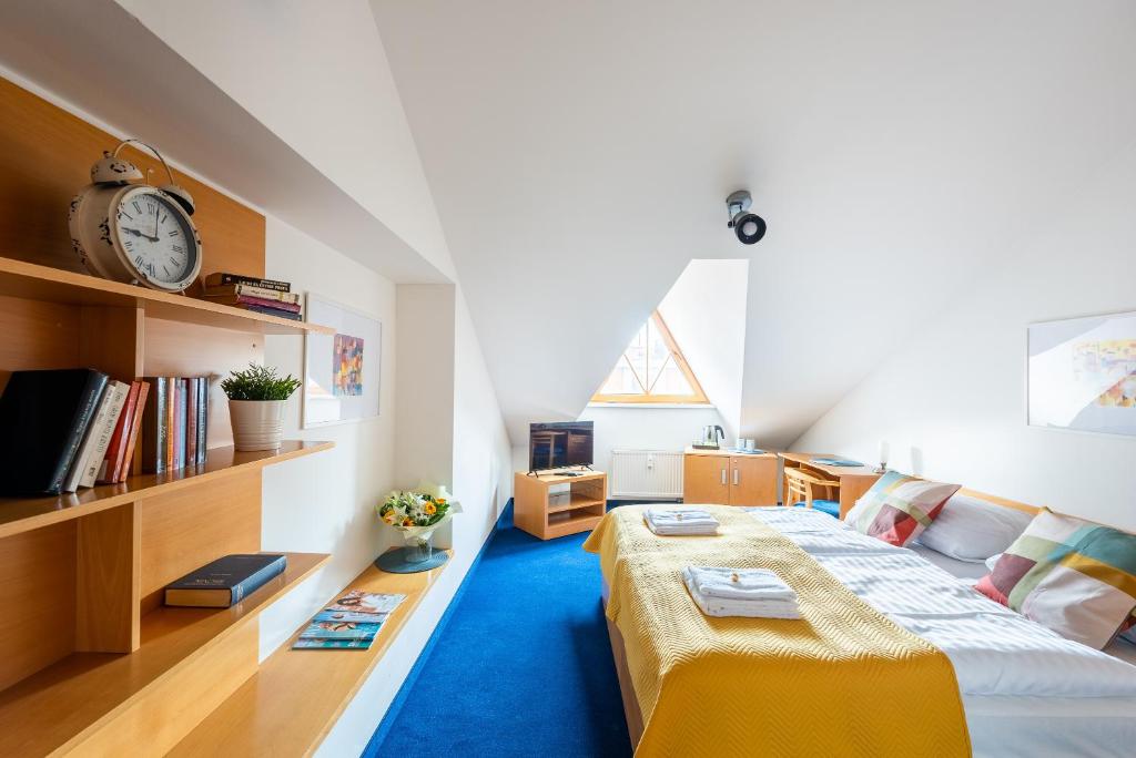 Postel nebo postele na pokoji v ubytování Libero Residence