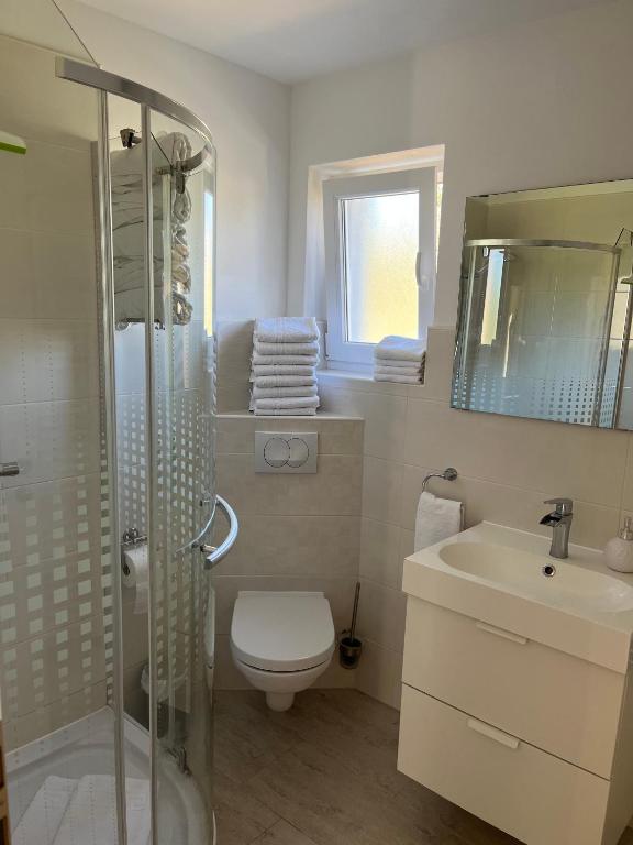 Kylpyhuone majoituspaikassa Apartmani Pax