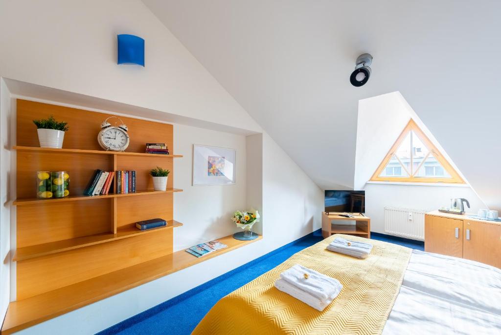 Postel nebo postele na pokoji v ubytování Libero Residence